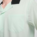 Nike SB Agnostic Olympic Kit Bowler Shirt, barely green / black