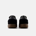 New Balance T500, black / black cement / gum