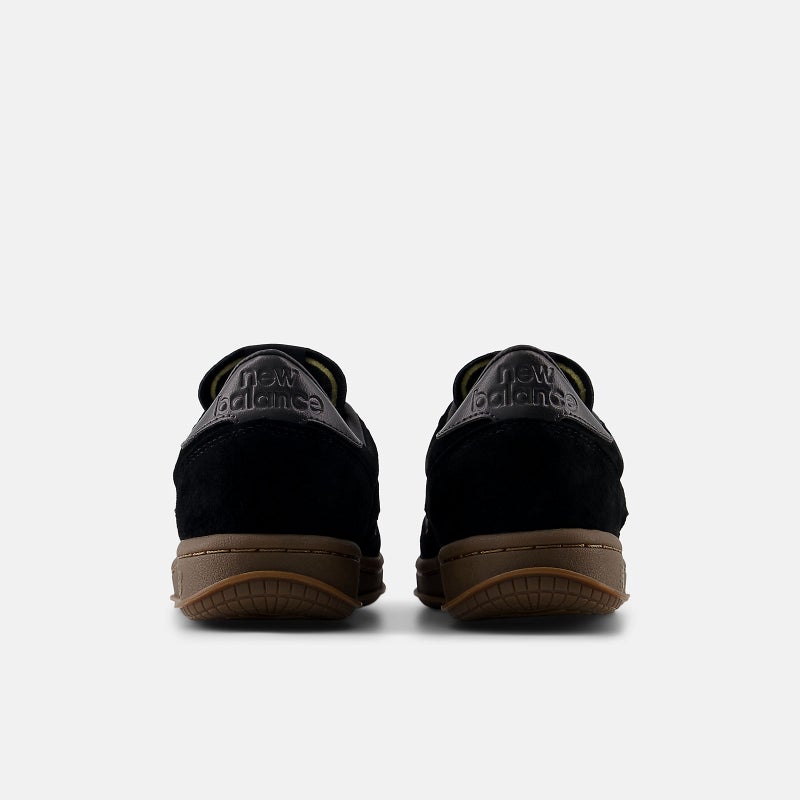 New Balance T500, black / black cement / gum